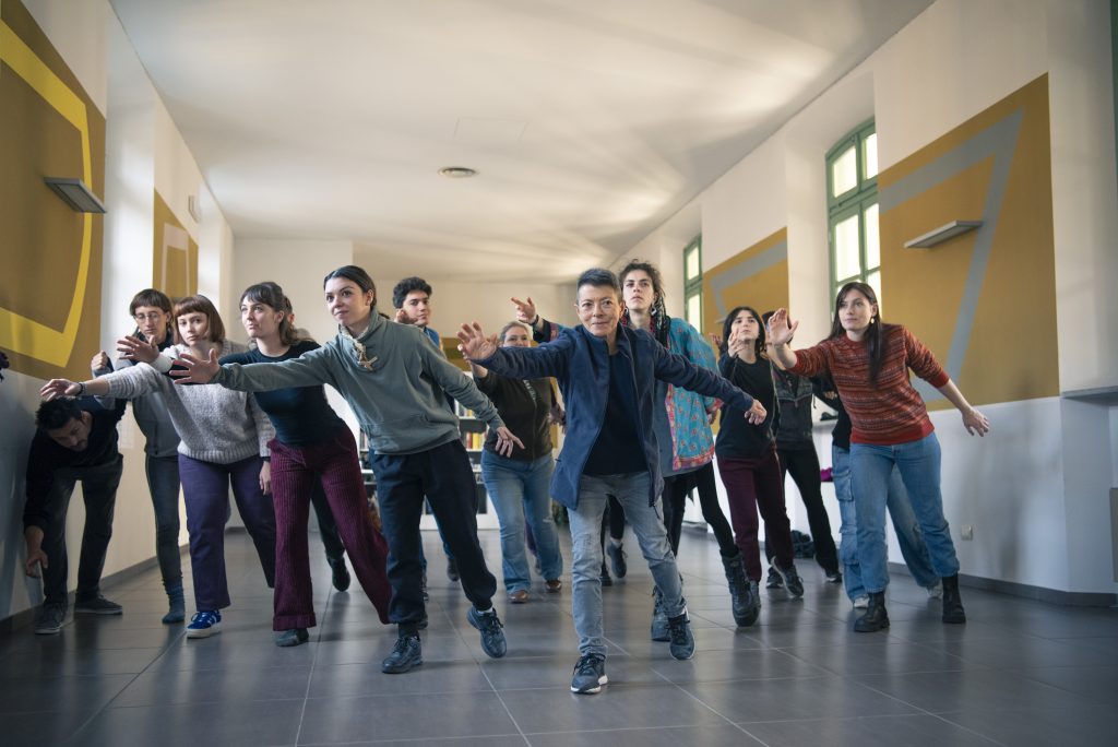 Individuals taking part in the course during rehearsals for a performance.
